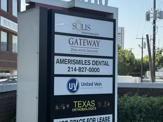 The 3310 Live Oak monument sign on the street, listing Texas Orthobiologics